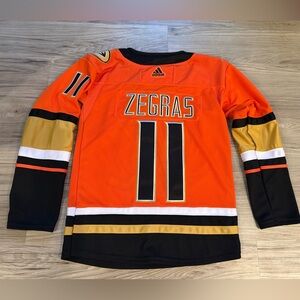 Adidas Anaheim Trevor Zegras Orange and Black Hockey Jersey Youth L/XL